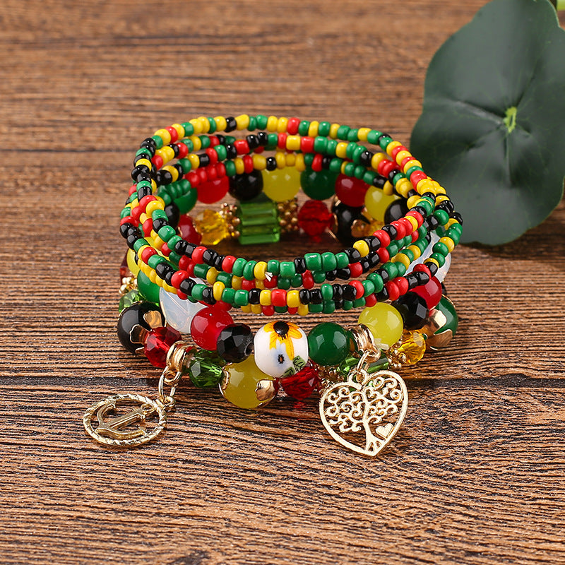 Pulsera con cuentas de múltiples colgantes cuidadas al por mayor